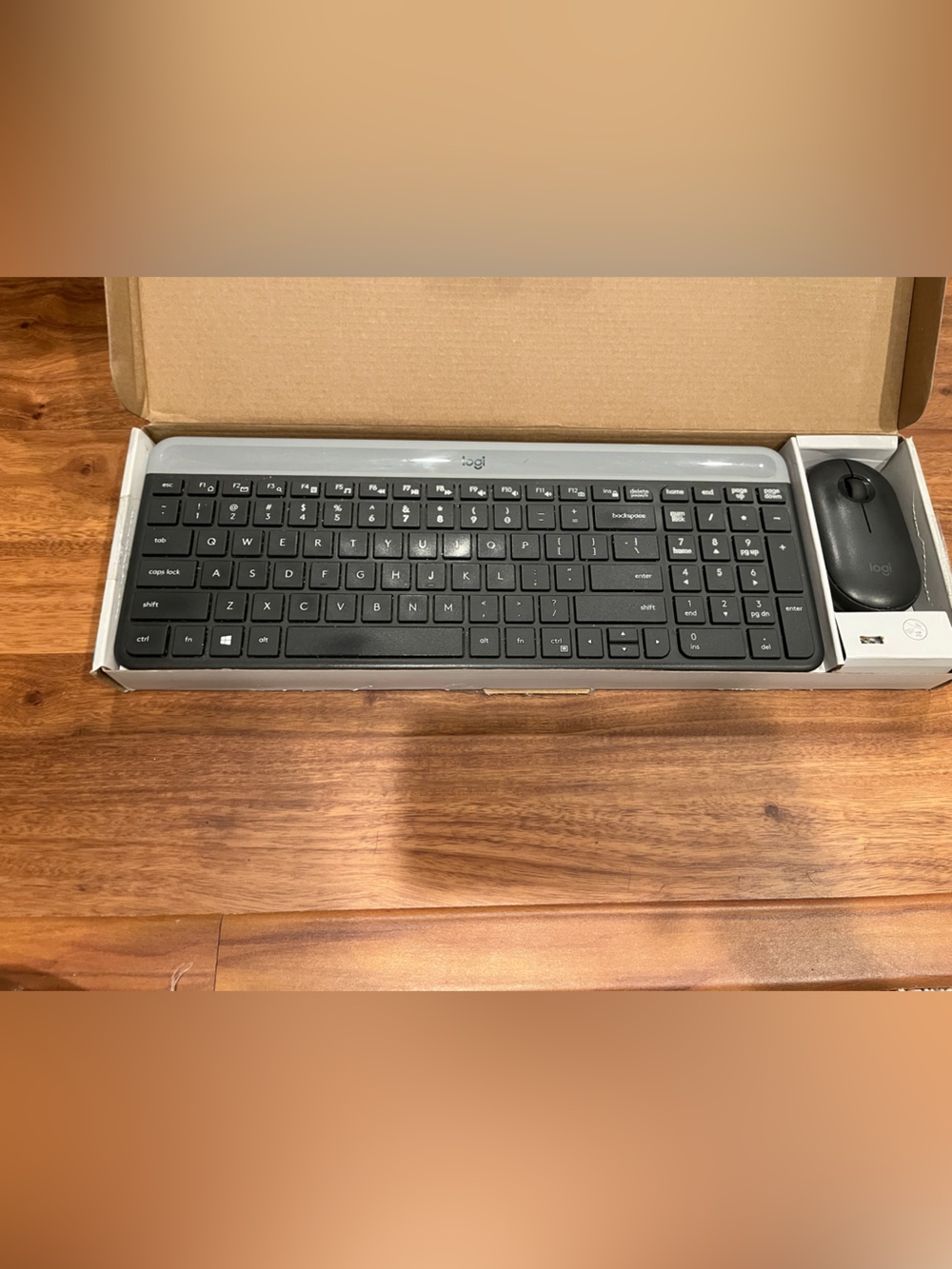 Logitech Black Keyboard and Mouse with Silver Top Trim